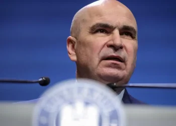 Guvernul Bolojan impozitează inițiativele caritabile. Ce sumă uriașă este obligat să achite cunoscutul preot Damaschin pentru „Depozitul faptelor bune”